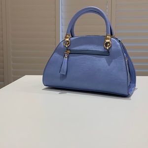 .Periwinkle blue mini bag. Leather. 10 inch. Perfect condition. Never worn.